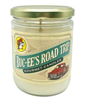Buc-ee's glass candle with vintage red truck illustration and turquoise label