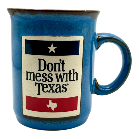 Blue ceramic mug - "Don't mess with Texas" text